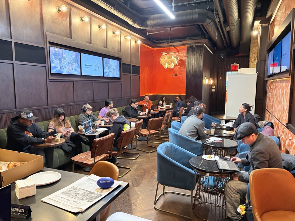 The room at Corgi Cafe during AI Search Lab NYC